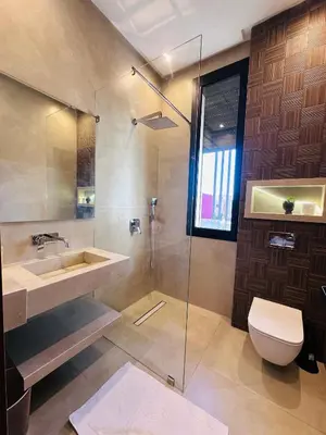 a bathroom with a sink and a toilet and a shower at Villa Tiffany NORIA GOLF in Marrakech