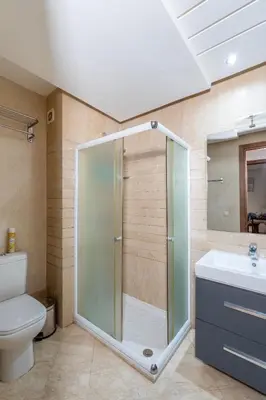a bathroom with a glass shower and a toilet at La Perle - Semlalia Gueliz - 2 Prs - Balcony in Marrakech