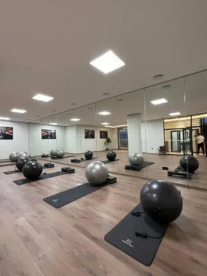 a room with rows of pilates balls on the floor at TERRASSE, 2 CHAMBRES SPACIEUSES, 6 COUCHAGES, 2 PiSCINES, PARKING, IDÈAL FAMILLE in Marrakech