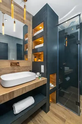 a bathroom with a tub and a glass shower at Villa Anzar Refined Oasis wChef and Emerald Hammam in El Rhechat