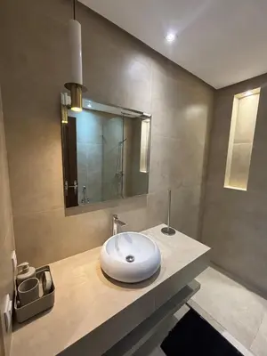 a bathroom with a sink and a mirror at Villa 4 Suites with Pool, near Hivernage in Marrakech