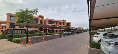 a street with orange cones in front of a building at Domaine de noria in Marrakech