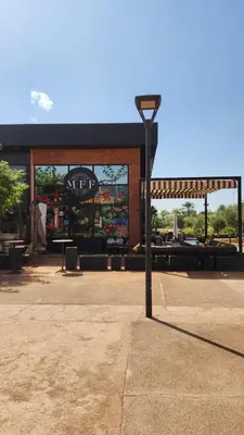 a street light in front of a store at Domaine de noria in Marrakech