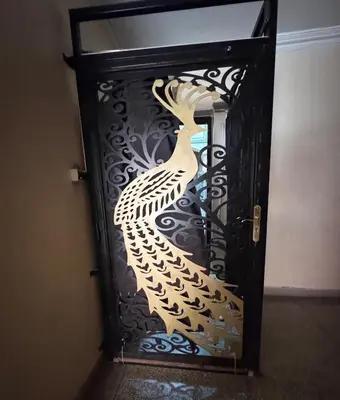 a door with a painting of a peacock on it at Beldi Luxury apartment near M Avenue with Free Parking in Marrakech