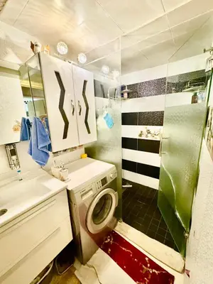 a bathroom with a sink and a toilet in it at Beldi Luxury apartment near M Avenue with Free Parking in Marrakech