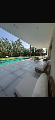 a view of a house with a swimming pool at Villa Alya in Marrakech