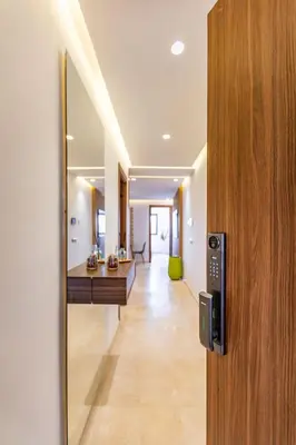a door leading into a room with a hallway at Ultra Central Gueliz 1 bedroom in Marrakech