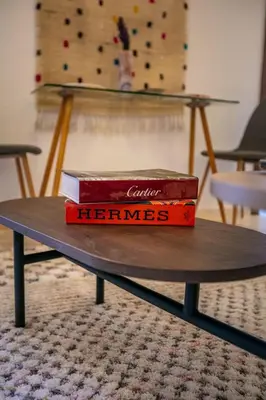 a book sitting on top of a table at Ultra Central Gueliz 1 bedroom in Marrakech