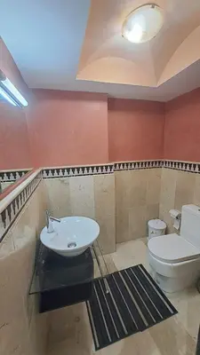 a bathroom with a toilet and a sink at Aux Majorelles-Gueliz in Marrakech