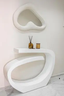 a white toilet in a white room with a bowl at The Crown Edition - Hivernage Marrakech in Marrakech