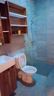a bathroom with a toilet and a sink at Appartement Aéroport Palm Marrakech-M9 in Marrakech
