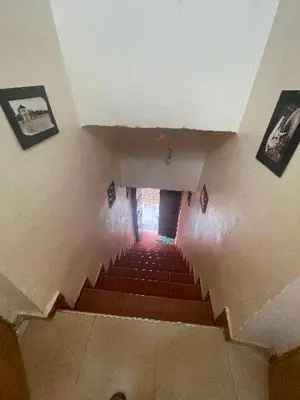 an overhead view of a staircase in a building at Dar darkoum in Marrakech