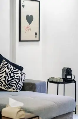 a living room with a couch and a table at Terrace & Fast Wi-Fi - Stylish city center flat - Gueliz in Marrakech
