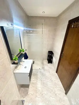 a bathroom with a sink and a mirror at Cozy Apartment 10 minutes from Gueliz and Medina in Marrakech