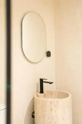 a bathroom with a sink and a mirror at Studio de reve au Coeur de Marrakech in Marrakech