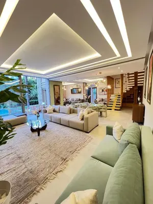 a large living room with couches and a table at Zen Villa Private Parking in El Rhechat