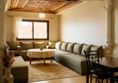 a living room with a couch and a table at Séjour confortables et proche de tous in Marrakech