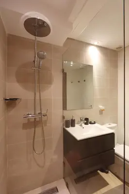 a bathroom with a sink and a shower at Apartment in the Heart of Marrakech 5th Floor in Marrakech