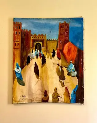 a painting of a group of people sitting on a mountain at Appartement familial au charme berbère in Marrakech