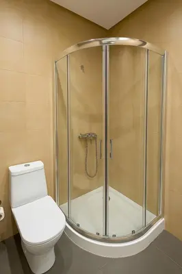 a bathroom with a shower with a toilet at Gueliz carree Eden apartment in Marrakech