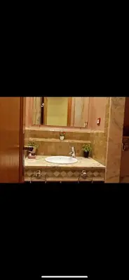 a bathroom with a sink and a mirror at Pure havre de paix à Marrakech in Marrakech