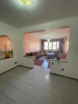 a living room with a couch and a table at Majorele in Marrakech