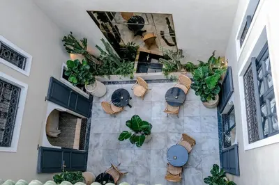an overhead view of a room with potted plants on the wall at Riad Layl Marrakech a seulement 2 minutes à pied de la célèbre place Jemaa El Fna in Marrakech