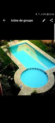 a picture of a large swimming pool with at andlous 4 in Marrakech
