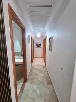 a hallway with a hallway leading to a room at andlous 4 in Marrakech
