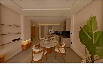 a kitchen and dining room with a table and chairs at Appartement chic Menara Mall piscine Rooftop in Marrakech