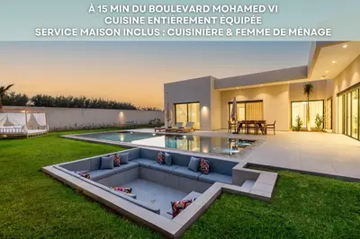 a magazine advertisement for a house with a swimming pool at Villa Milabel - Piscine et jardin Privée Sans vis-à-vis Wifi HD in Oulad Akkou