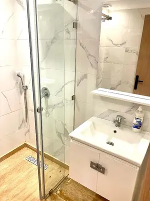 a bathroom with a sink and a shower at Gueliz Harmony in Marrakech