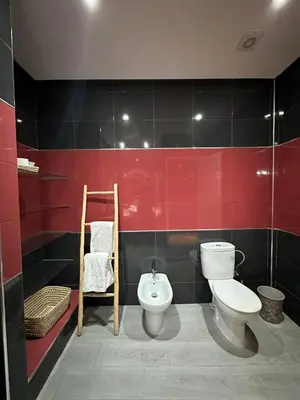 a bathroom with a toilet and a bidet at Villa Amroth in Marrakech