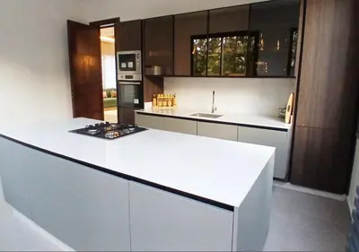 a kitchen with a white counter top and a stove at Villa Soleil Couchant in Marrakech