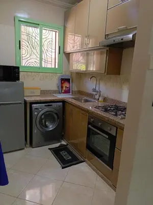 a kitchen with a washer and a dishwasher at My Marrakesh - G Floor in Marrakech