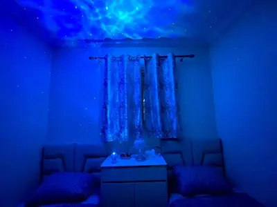 a blue room with two beds and a blue ceiling at My Marrakesh - G Floor in Marrakech