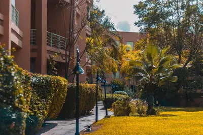 a street light in front of a building at Modern Marrakech Garden Retreat Pool & Balcony in Marrakech