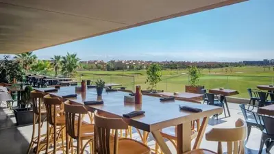 a group of tables and chairs on a patio at Marrakech prestigia in Marrakech