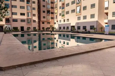 a swimming pool in the middle of a building at Marrakech Calm Getaway 2 Pools & City Access in Marrakech