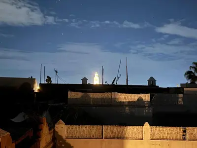 a view of a city at night with the sky at Échappée onirique au cœur de la Cité Ocre in Marrakech