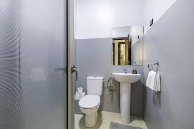 a bathroom with a toilet and a sink at Comfort and Simplicity in Marrakech in Marrakech