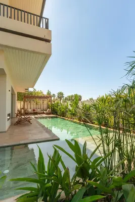 a swimming pool in the backyard of a villa at splendid Villa King palace in Marrakech