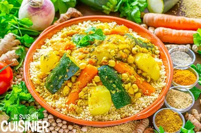 an orange bowl of rice with vegetables and other ingrediants at studio chez l'habitant in Marrakech