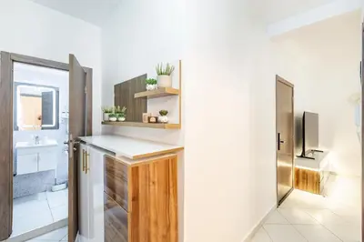 a kitchen with a sink and a counter top at Luxueux appartement in Marrakech