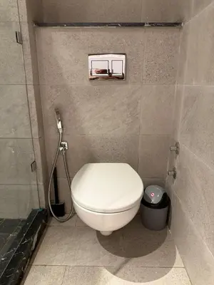 a bathroom with a white toilet in a stall at New apartment in Jnane El Guéliz in Marrakech