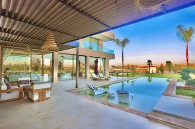 an image of a house with a swimming pool at Villa youngLA in Sehib Foukani