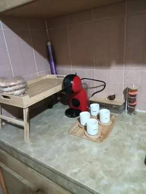 a pretend kitchen with a mixer and cups on a counter at Appartement Marrakech gueliz climatisé avec piscine et baby foot in Marrakech