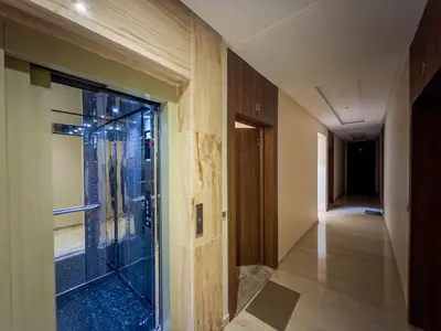 a glass shower in a room with a hallway at Modern & cozy 2 bedroom apartment in Marrakech