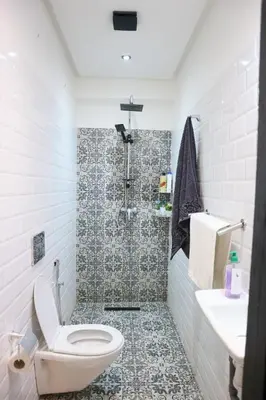a bathroom with a shower and a toilet and a sink at Central B1 Chic & Shock , hivernage city center in Marrakech