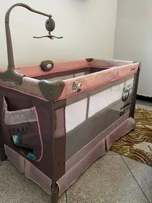 a bed with a desk with a lamp on top at MarrakLuft in Marrakech